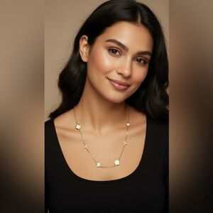 Delicate Gold Necklace with White Clover Accents